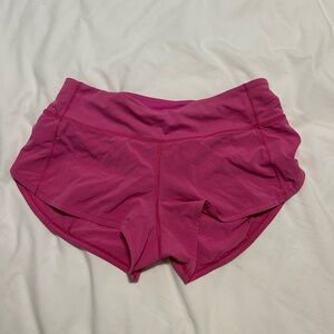 Pink lululemon speed up shorts